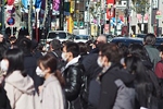 Citizens wearing protective masks in Shibuya, Tokyo, Japan. nakashi