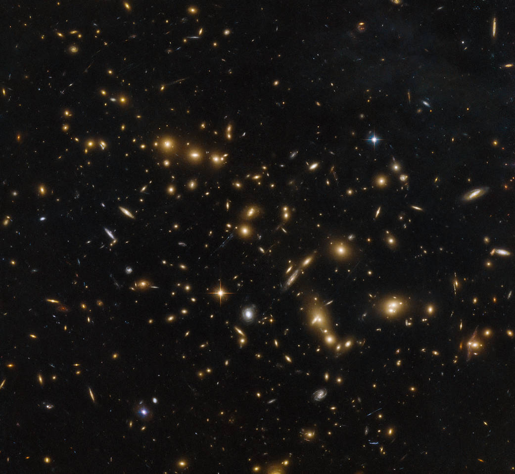 a massive group of galaxies in a cluster named RXC J0032.1+1808 | ESA/Hubble & NASA, RELICS