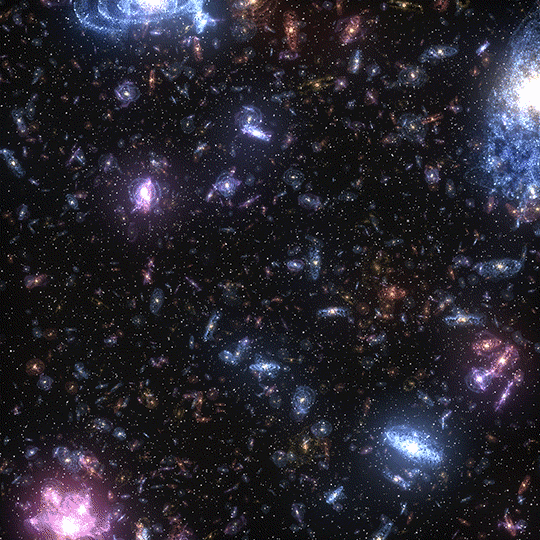 Galaxies floating through space | giphy.com | Image Credit: xponentialdesign Galaxies floating through space | giphy.com | Image Credit: xponentialdesign